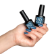 BO.Nail bo-soakable-gel-polish Hand holding Bottles. 030 Pigeon Blue