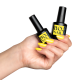 BO.Nail bo-soakable-gel-polish Hand holding Bottles. 058 Lemon